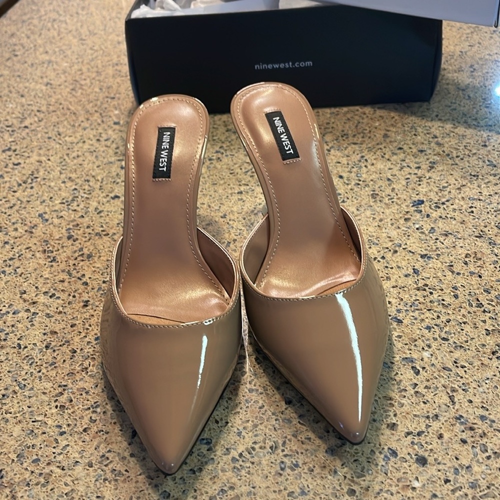 New In Box. Never worn. Nine West Natural with Clear Heels. Size 9.5 M